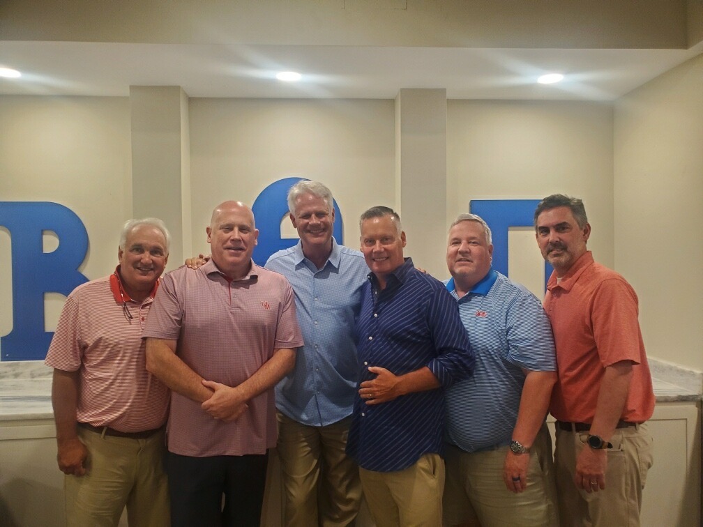 Six Ole Miss Beta alumni together at the chapter house