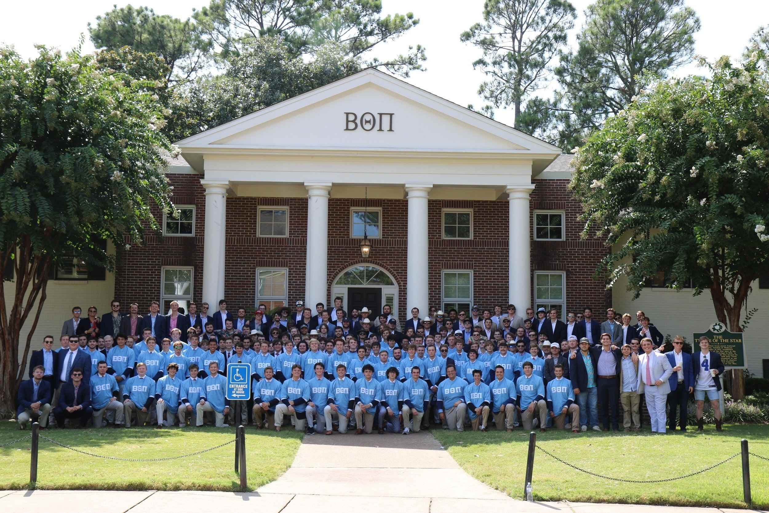 Ole Miss Beta chapter members gathered in front of the chapter house